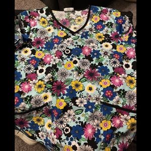 Colorful scrub top in medium.